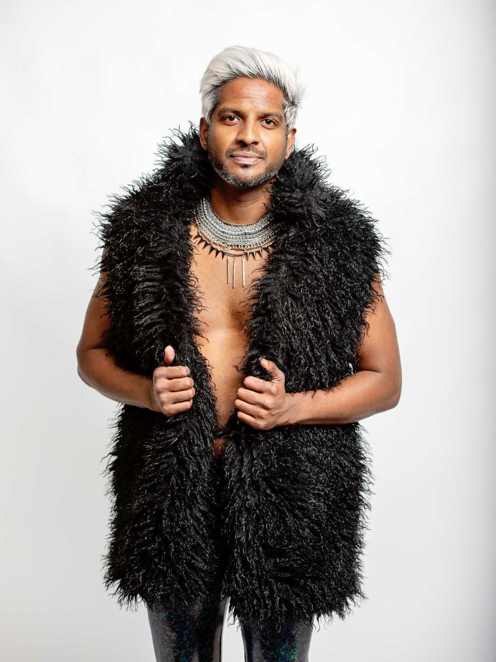 Black shaggy sleeveless fur jacket